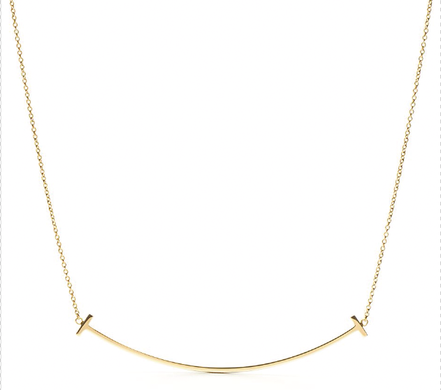 Tiffany T Smile necklace in yellow gold by Tiffany & Co