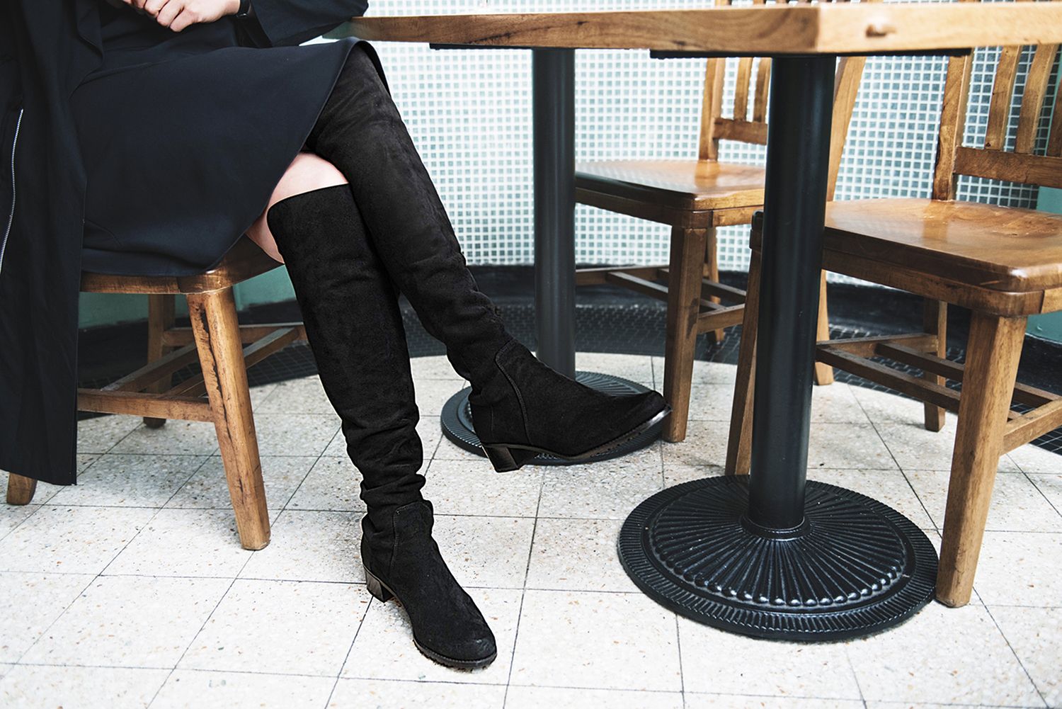 Betty wears the Reserve boots by Stuart Weitzman (Photos: Moses Ng/Hong Kong Tatler)