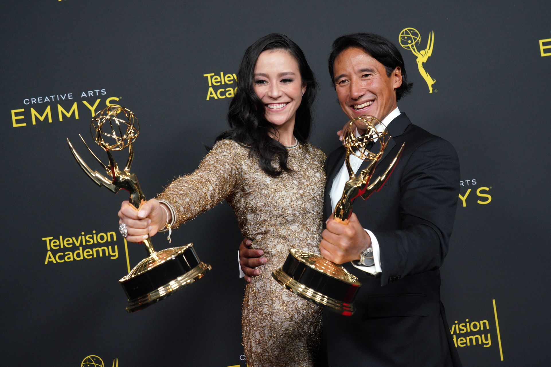 LOS ANGELES, CALIFORNIA - SEPTEMBER 14: Elizabeth Chai Vasarhelyi (L) and Jimmy Chin pose in the press room with their awards for outstanding directing for a documentary / nonfiction program for 'Free Solo' during the 2019 Creative Arts Emmy Awards on September 14, 2019 in Los Angeles, California. (Photo by JC Olivera/WireImage)