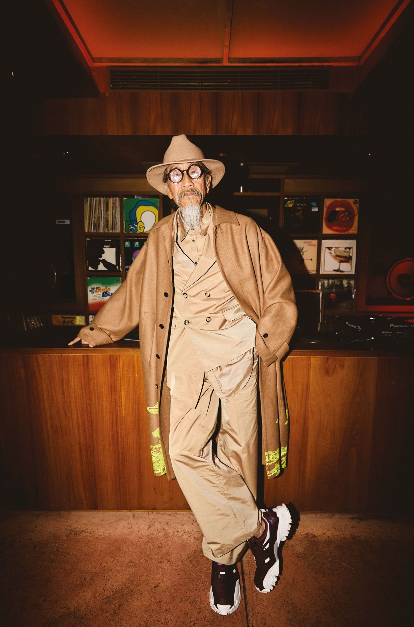 Coat, blazer, shirt, trousers and shoes by Valentino; hat by Emporio Armani; glasses by Prada