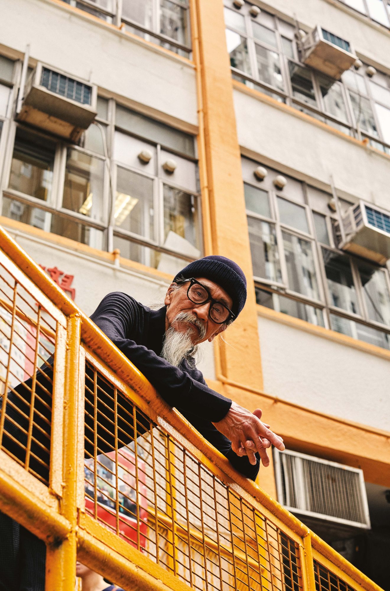 Top by Ermenegildo Zegna; beanie by Emporio Armani; glasses by Ray-Ban