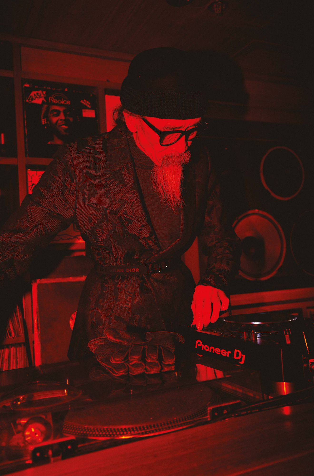 Blazer, sweater, trousers and gloves by Ermenegildo Zegna; belt by Dior Homme; shoes by Celine; beanie by Emporio Armani; glasses by Ray-Ban