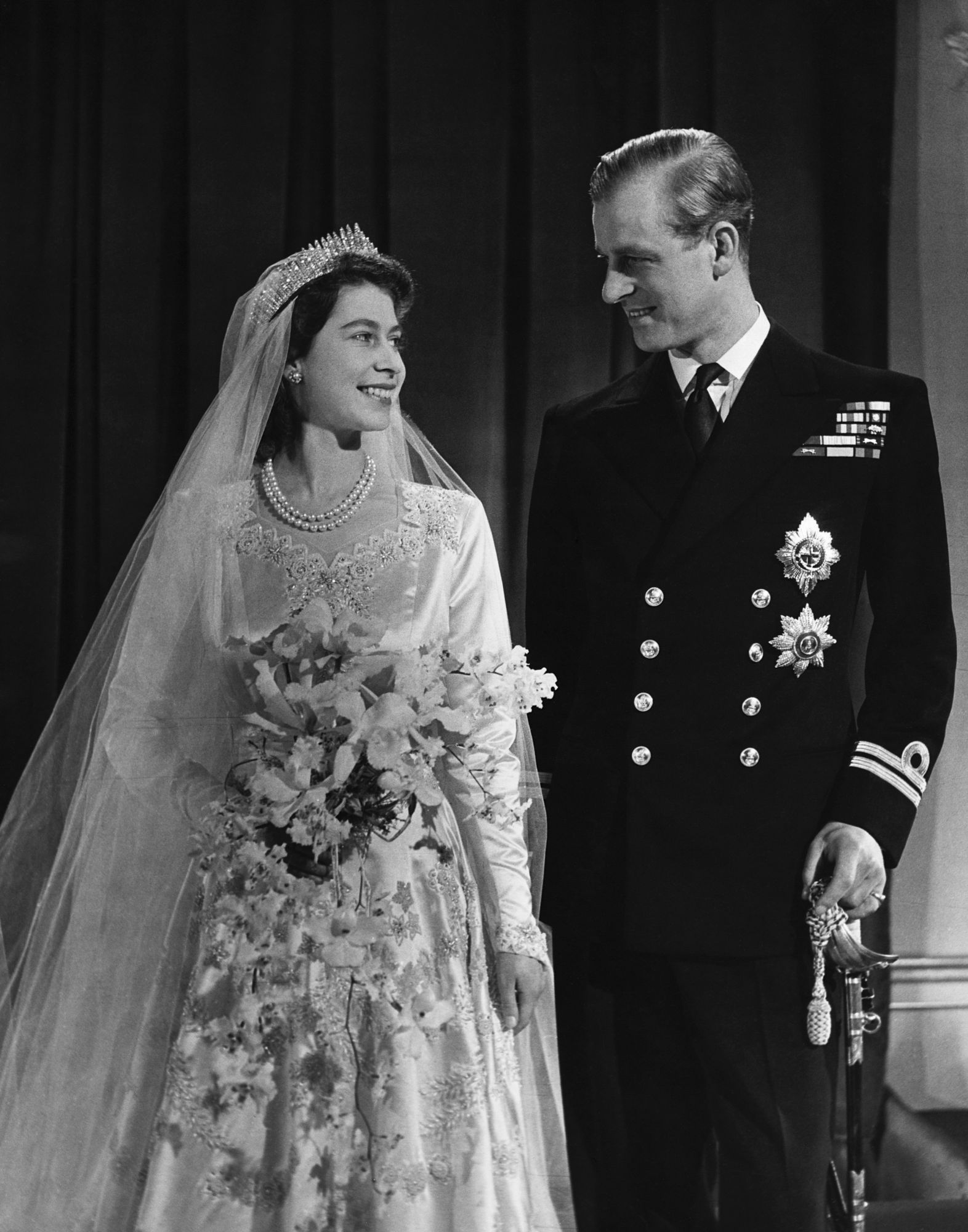 Princess Elizabeth, later Queen Elizabeth II with her husband Phillip, Duke of Edinburgh, after their marriage, 1947. (Photo by © Hulton-Deutsch Collection/CORBIS/Corbis via Getty Images)