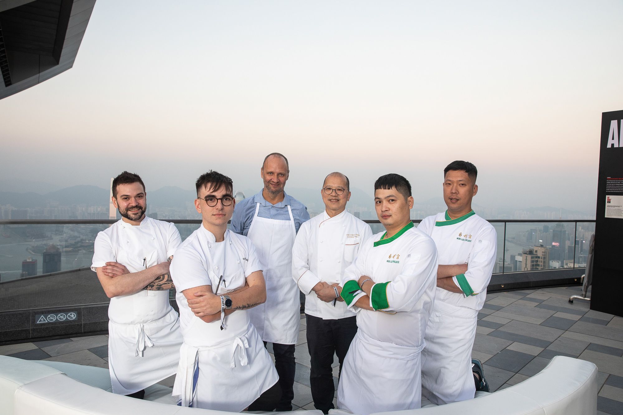 Simon Rogan of L'Enclume and Roganic with Tam Kwok Fung of Wing Lei Palace and their teams