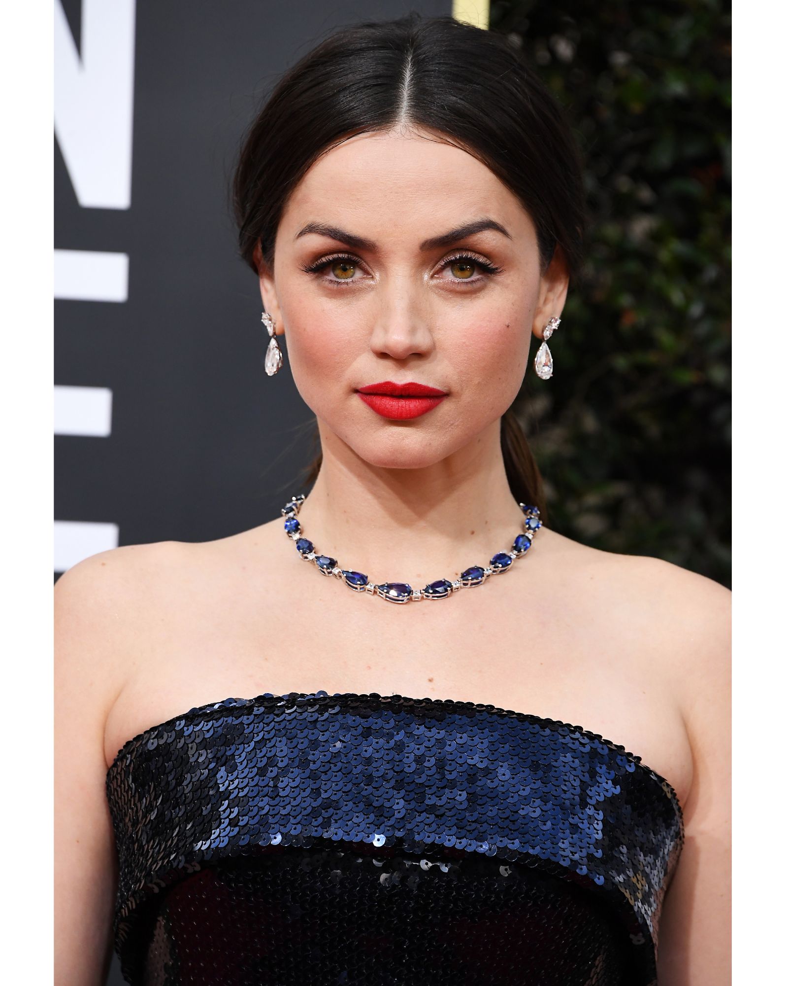 Ana de Armas, who was nominated for her performance in Knives Out, wore a Tiffany & Co necklace set with sapphires and diamonds, alongside two pairs of earrings and a ring set with a tanzanite stone that weighed over 18 carats