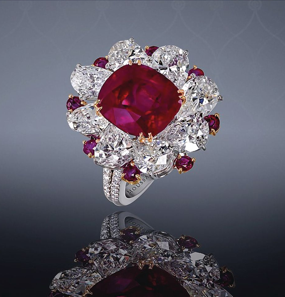 Ring in platinum set with rubies and diamonds by Moussaieff