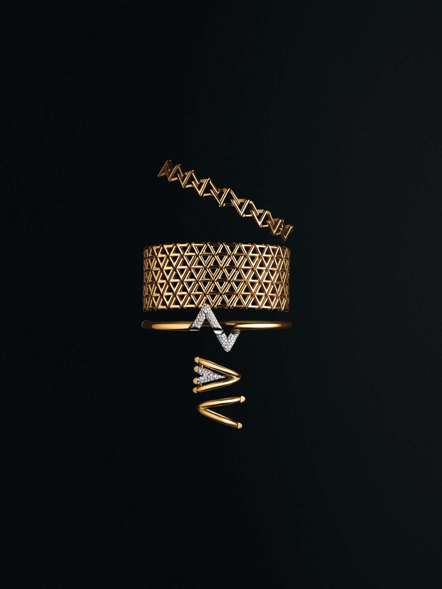 Bracelets and rings in yellow gold set with and without diamonds, all from the LV Volt collection by Louis Vuitton