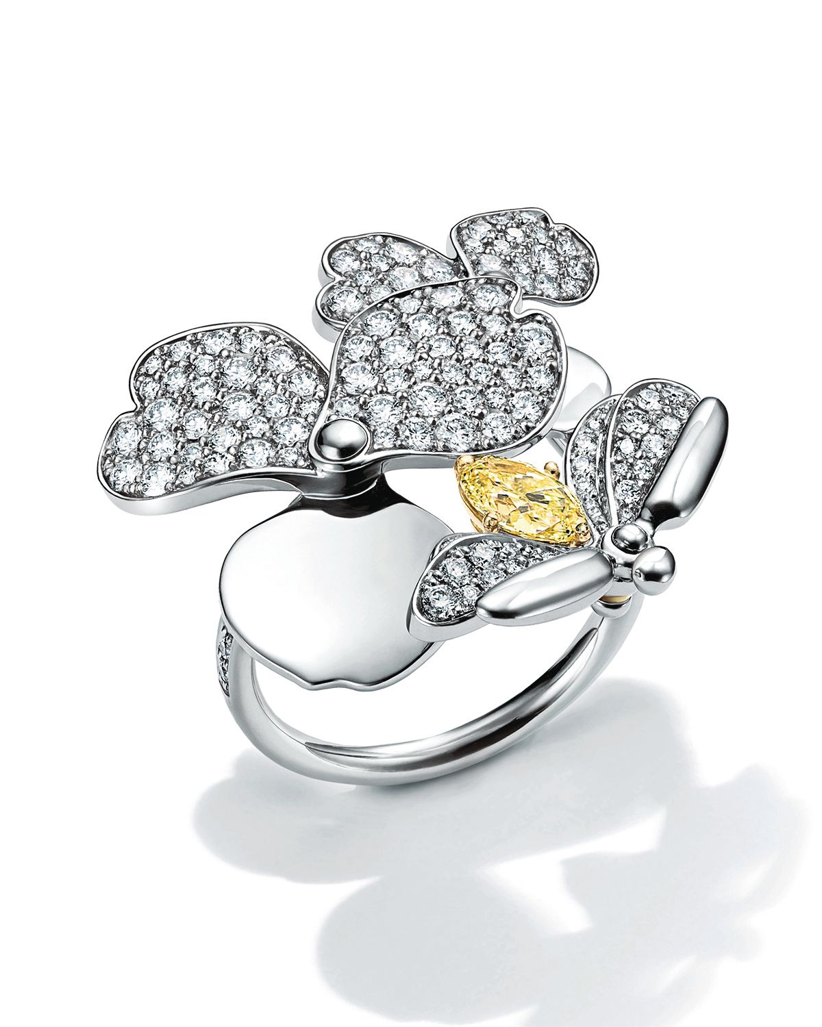 Paper Flowers Firefly ring in platinum set with a yellow diamond and white diamonds by Tiffany & Co