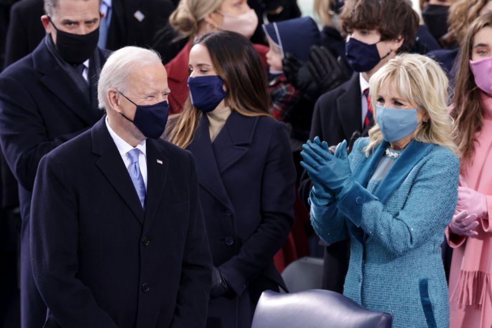 Jill Biden wears a dress, coat, and mask by Markarian at the inauguration (photo: Alex Wong/Getty Images)