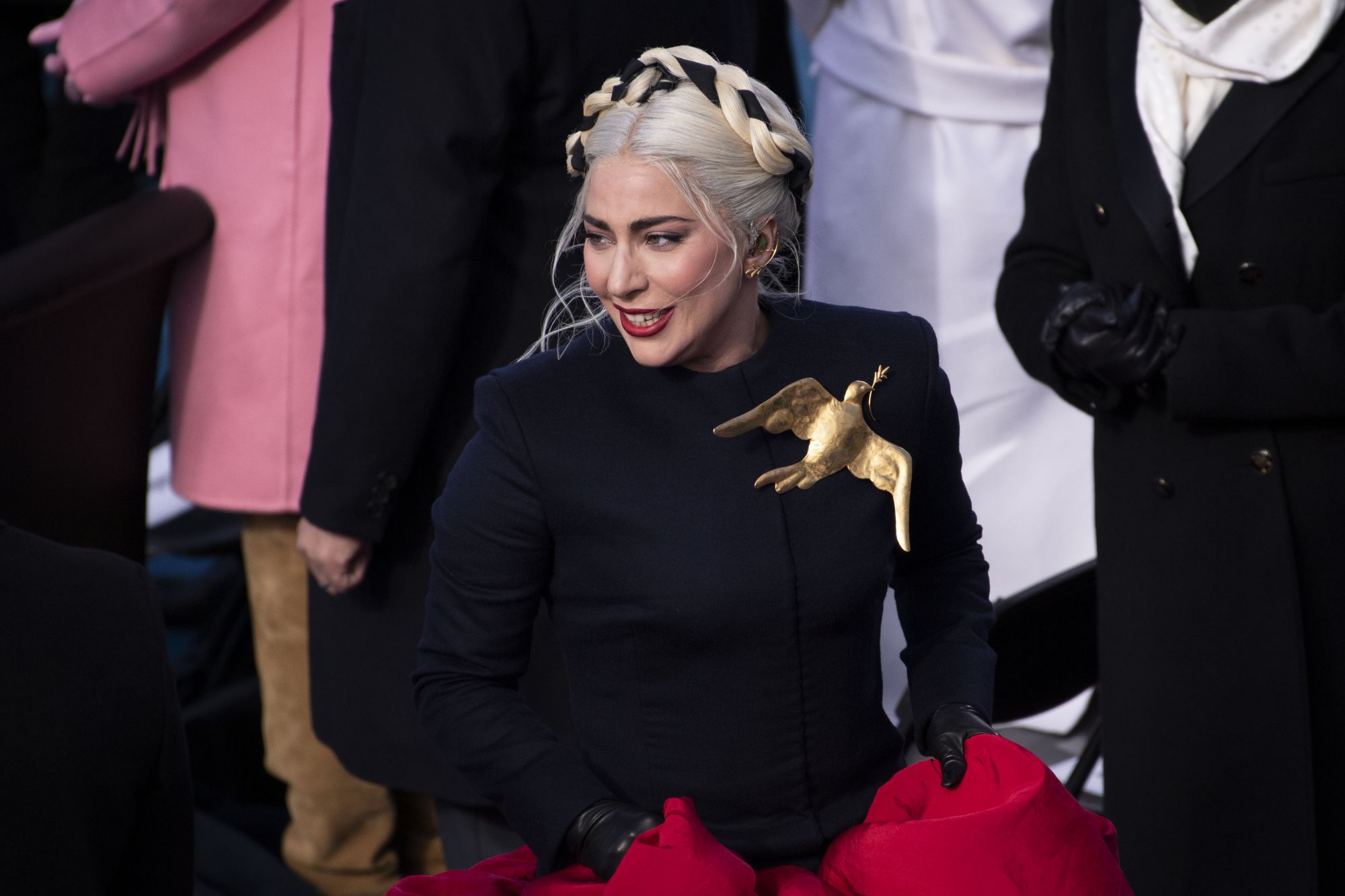 The Meaning Behind Lady Gaga's Schiaparelli Gold Brooch From Her