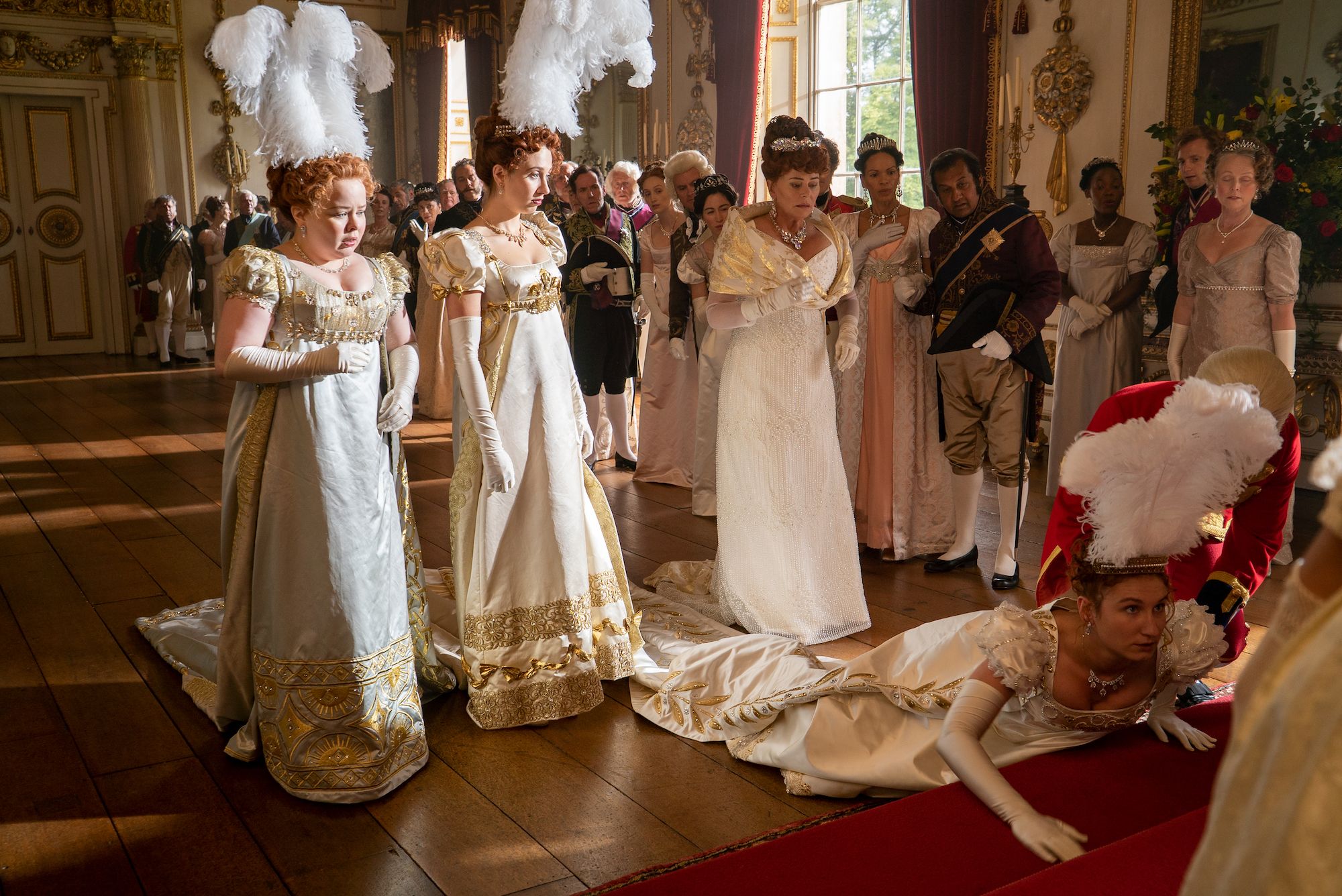 BRIDGERTON (L to R) NICOLA COUGHLAN as PENELOPE FEATHERINGTON, HARRIET CAINS as PHILLIPA FEATHERINGTON, BESSIE CARTER as PRUDENCE FEATHERINGTON and POLLY WALKER as PORTIA FEATHERINGTON in episode 101 of BRIDGERTON Cr. LIAM DANIEL/NETFLIX © 2020