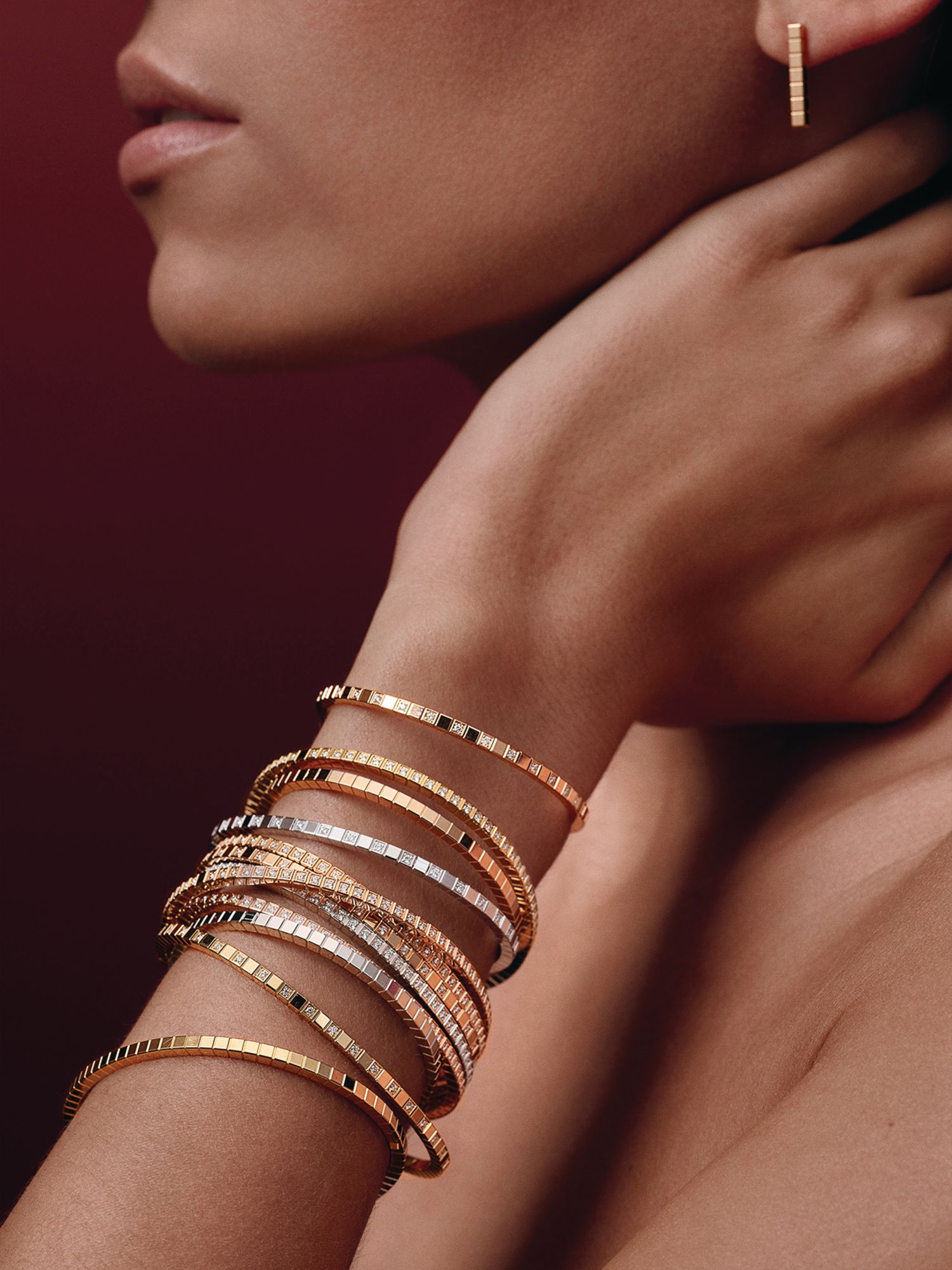 Ice Cube bangles in rose, white and yellow gold set with or without diamonds by Chopard