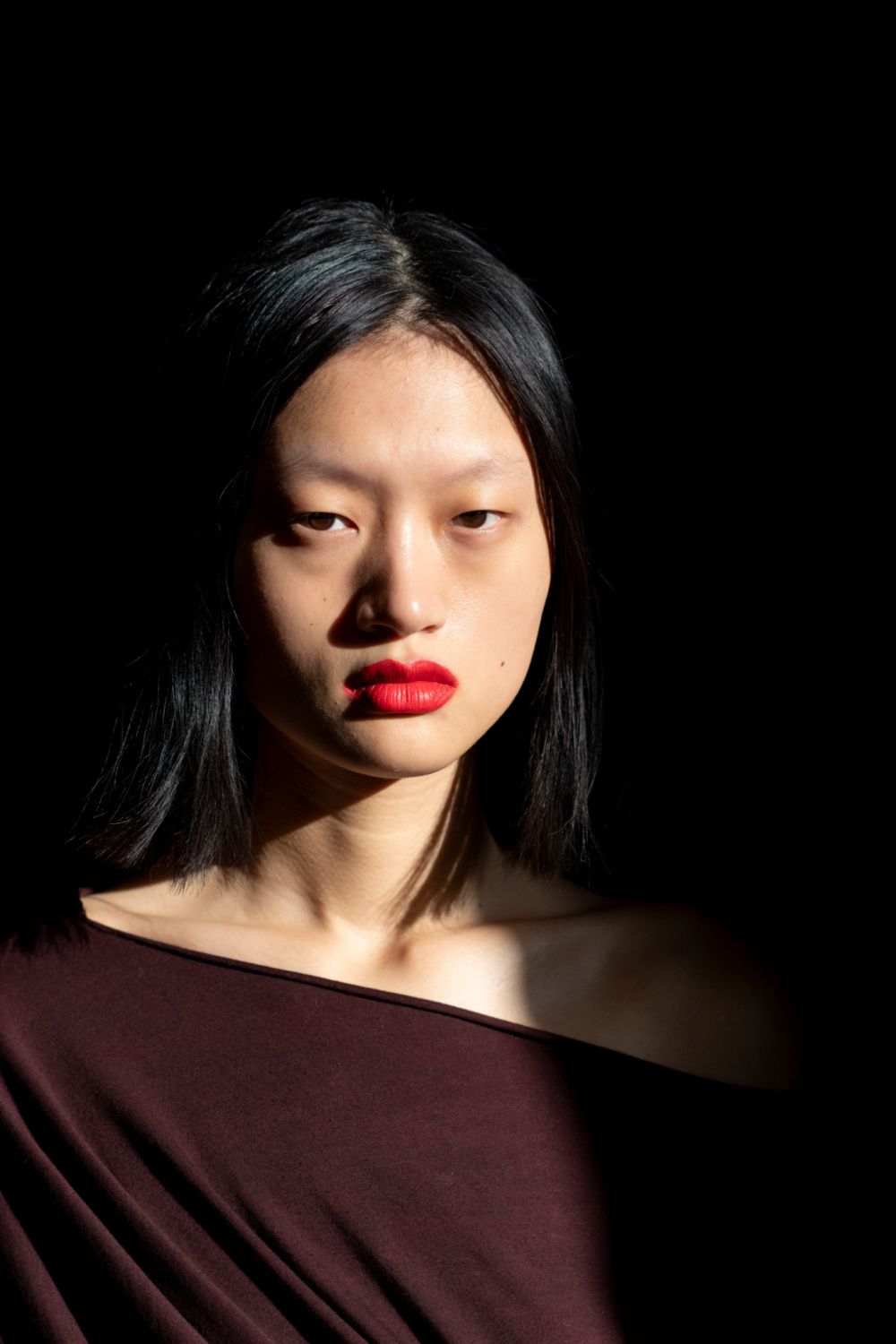 Red lips backstage at Sportmax's autumn-winter 2021 show at Milan Fashion Week (Photo by Kristy Sparow/Getty Images)