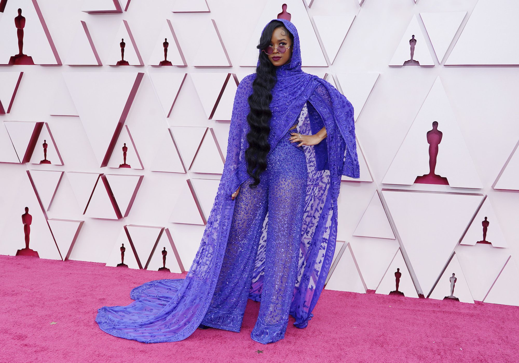 H.E.R. arrives at the Oscars on Sunday, April 25, 2021, at Union Station in Los Angeles. (AP Photo/Chris Pizzello, Pool)