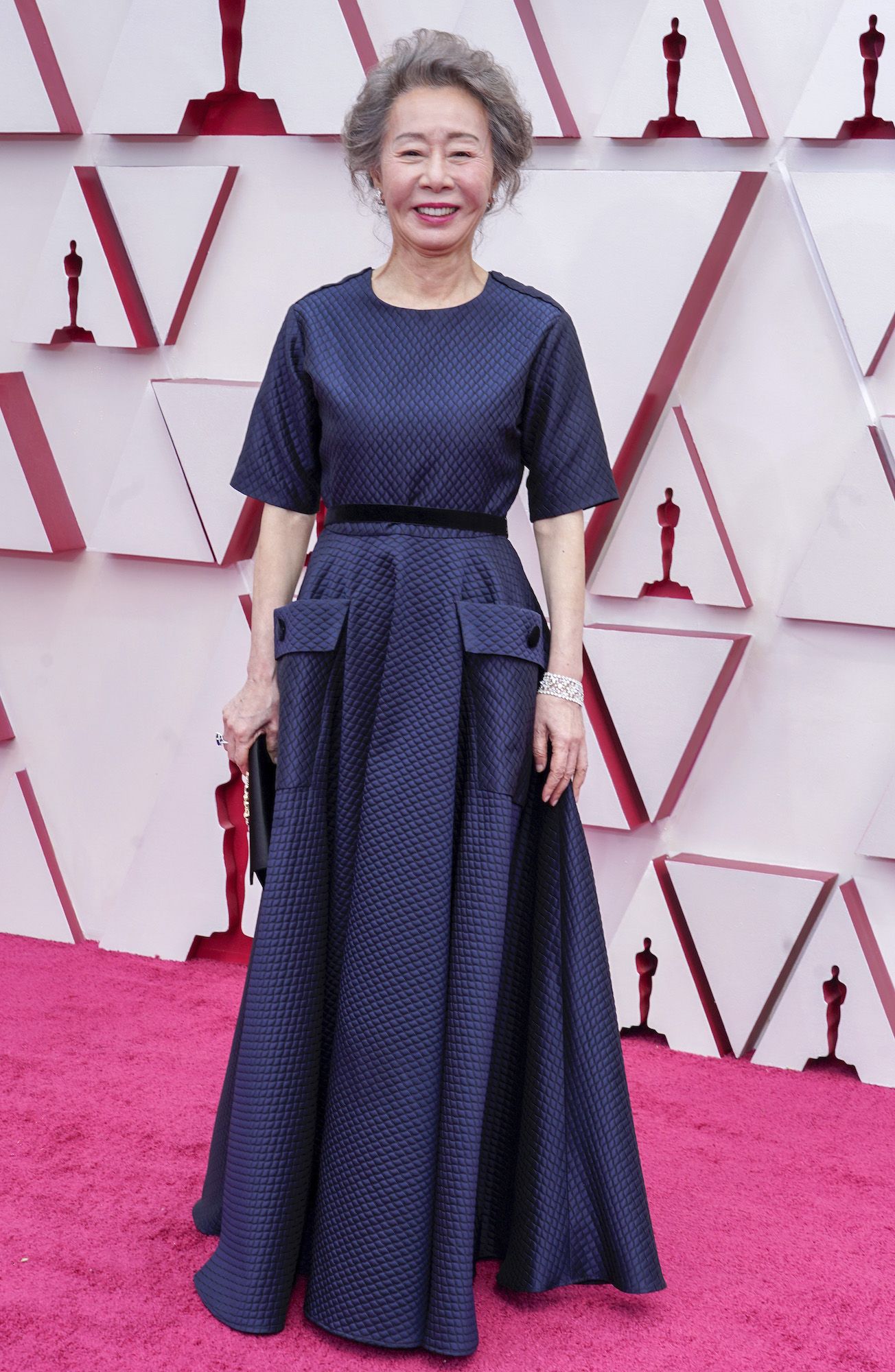 Youn Yuh-jung arrives at the Oscars on Sunday, April 25, 2021, at Union Station in Los Angeles. (AP Photo/Chris Pizzello, Pool)