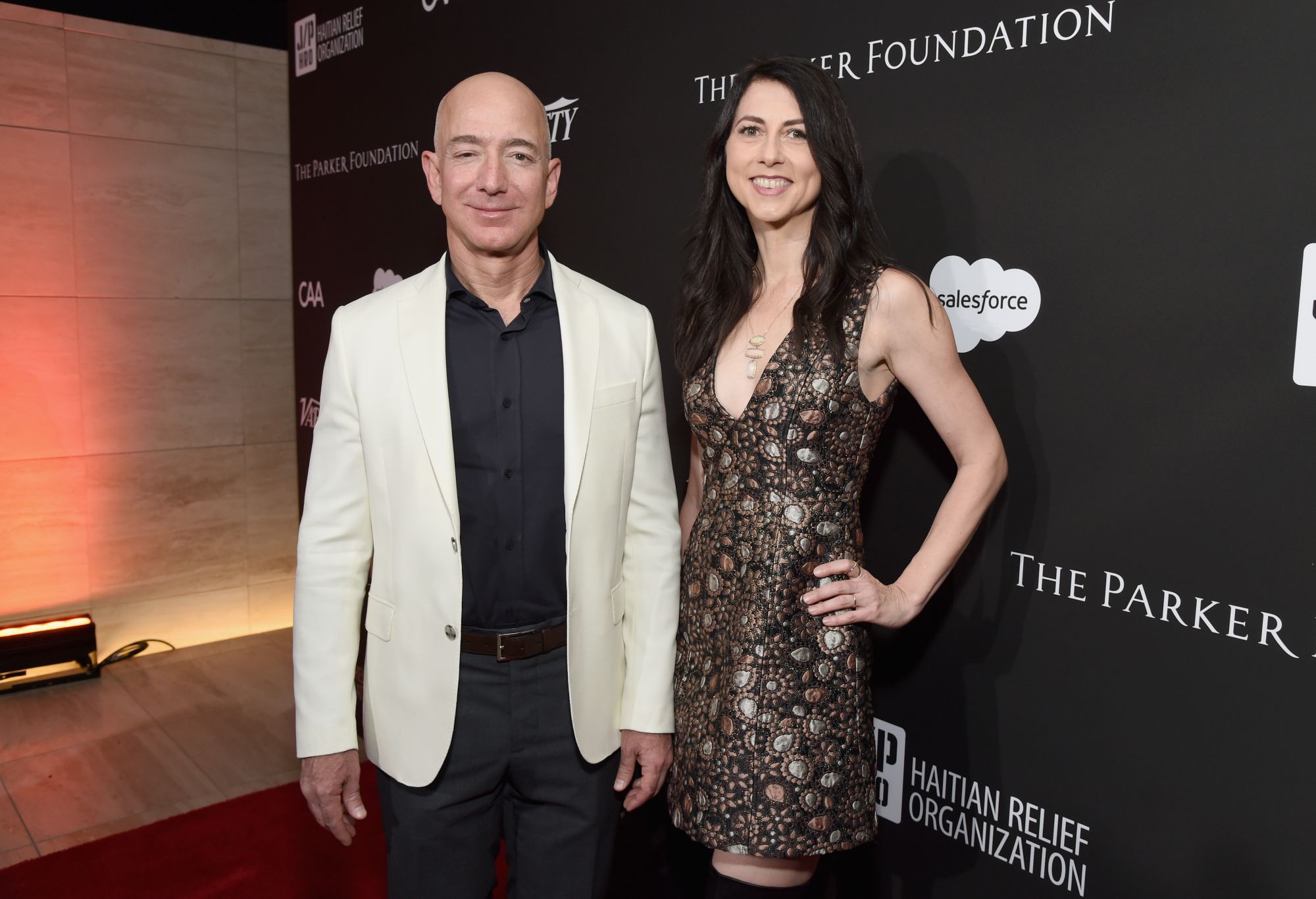 LOS ANGELES, CA - JANUARY 06: Chief Executive Officer of Amazon Jeff Bezos (L) and MacKenzie Bezos attend the 7th Annual Sean Penn & Friends HAITI RISING Gala benefiting J/P Haitian Relief Organization on January 6, 2018 in Hollywood, California. (Photo by Michael Kovac/Getty Images for for J/P HRO Gala)