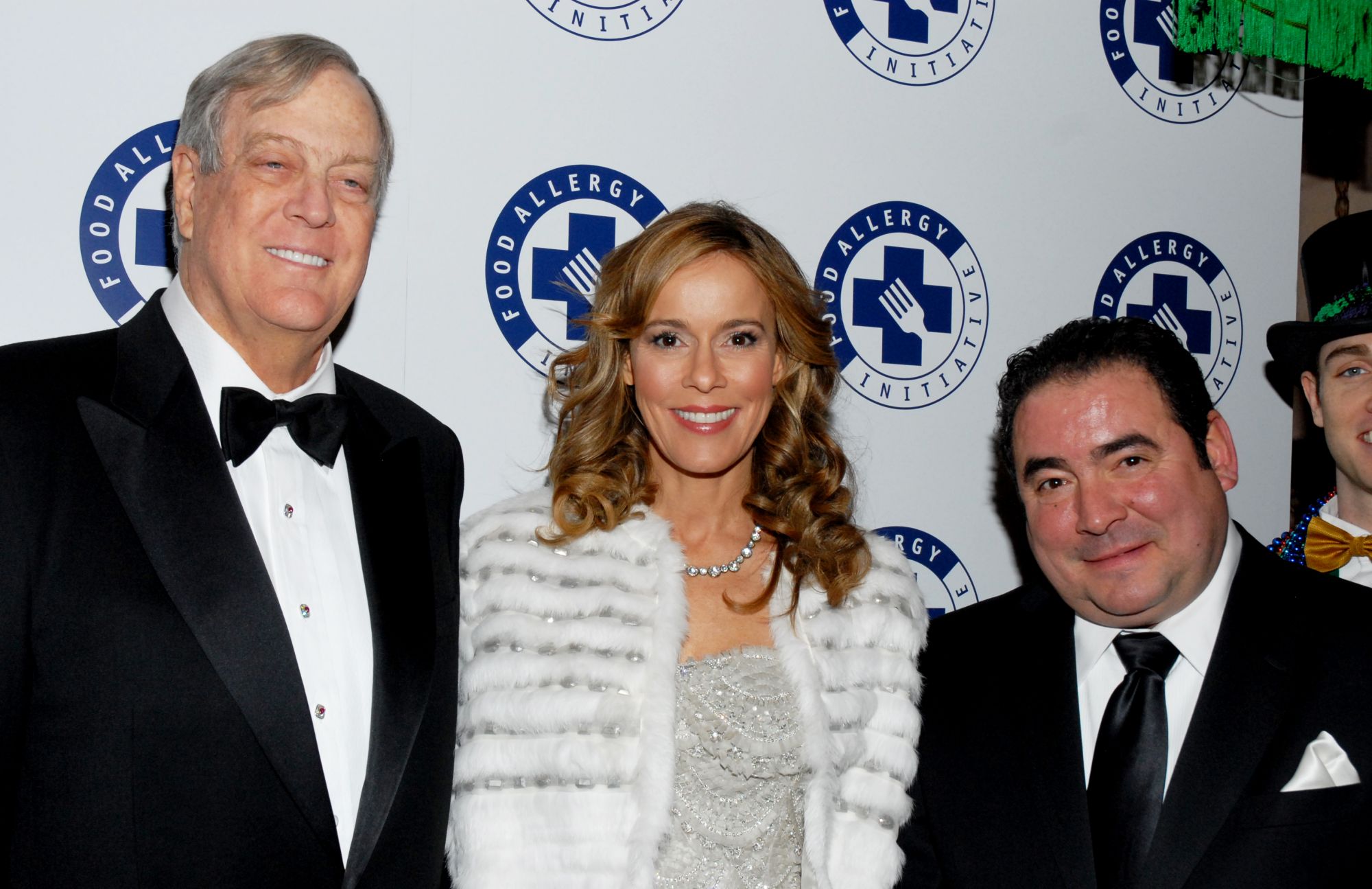 NEW YORK - DECEMBER 07: (L-R) David Koch, Julia Koch and Emeril Lagasse attend the 2009 Annual Food Allergy Ball at The Waldorf=Astoria on December 7, 2009 in New York City. (Photo by Michael N. Todaro/FilmMagic)