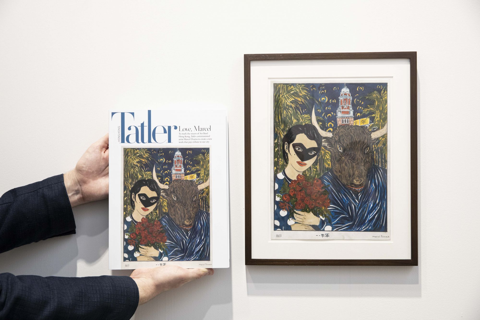 The May issue of Tatler Hong Kong features artwork created by artist Marcel Dzama. Executive editor Oliver Giles holds the magazine up near the actual piece of art, on display at the David Zwirner booth at Art Basel
