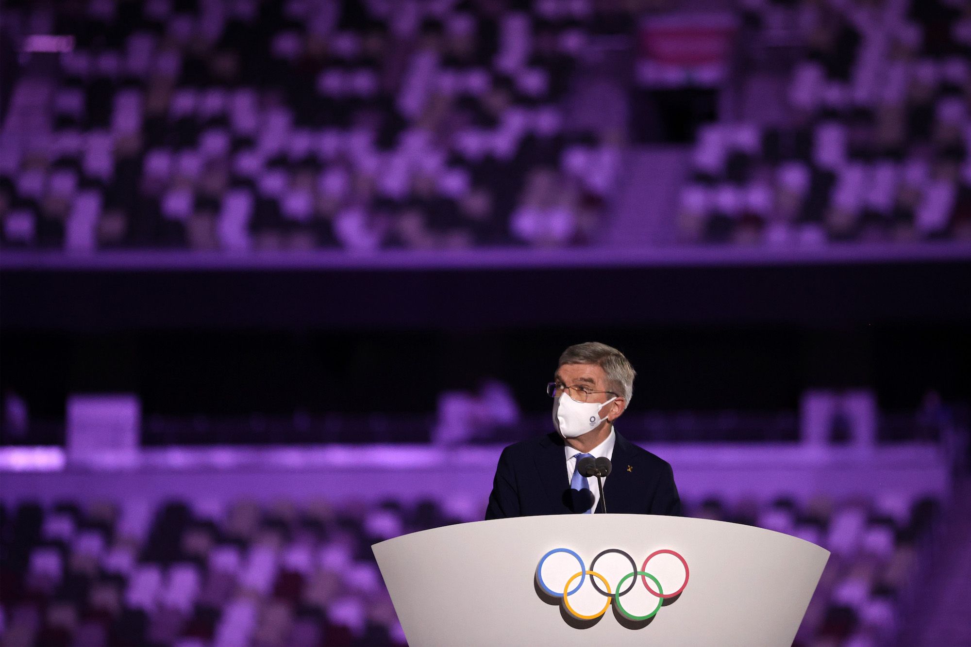TOKYO, JAPAN - JULY 23: Thomas Bach, IOC President makes a speech during the Opening Ceremony of the Tokyo 2020 Olympic Games at Olympic Stadium on July 23, 2021 in Tokyo, Japan. (Photo by Hannah McKay - Pool/Getty Images)