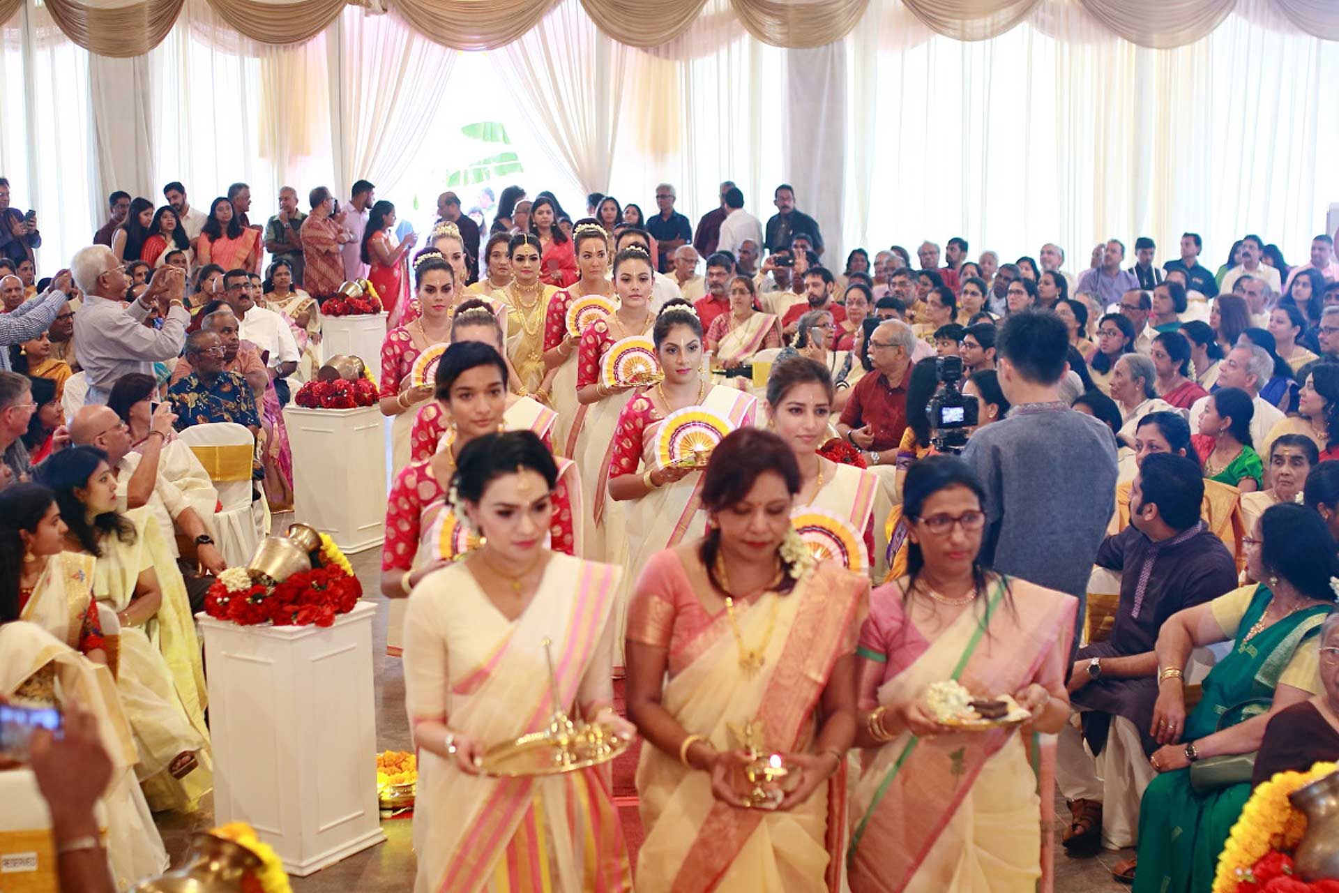 A throng made up of the couple's family members and friends filled the Sri Sundaraja Perumal Temple in Klang.