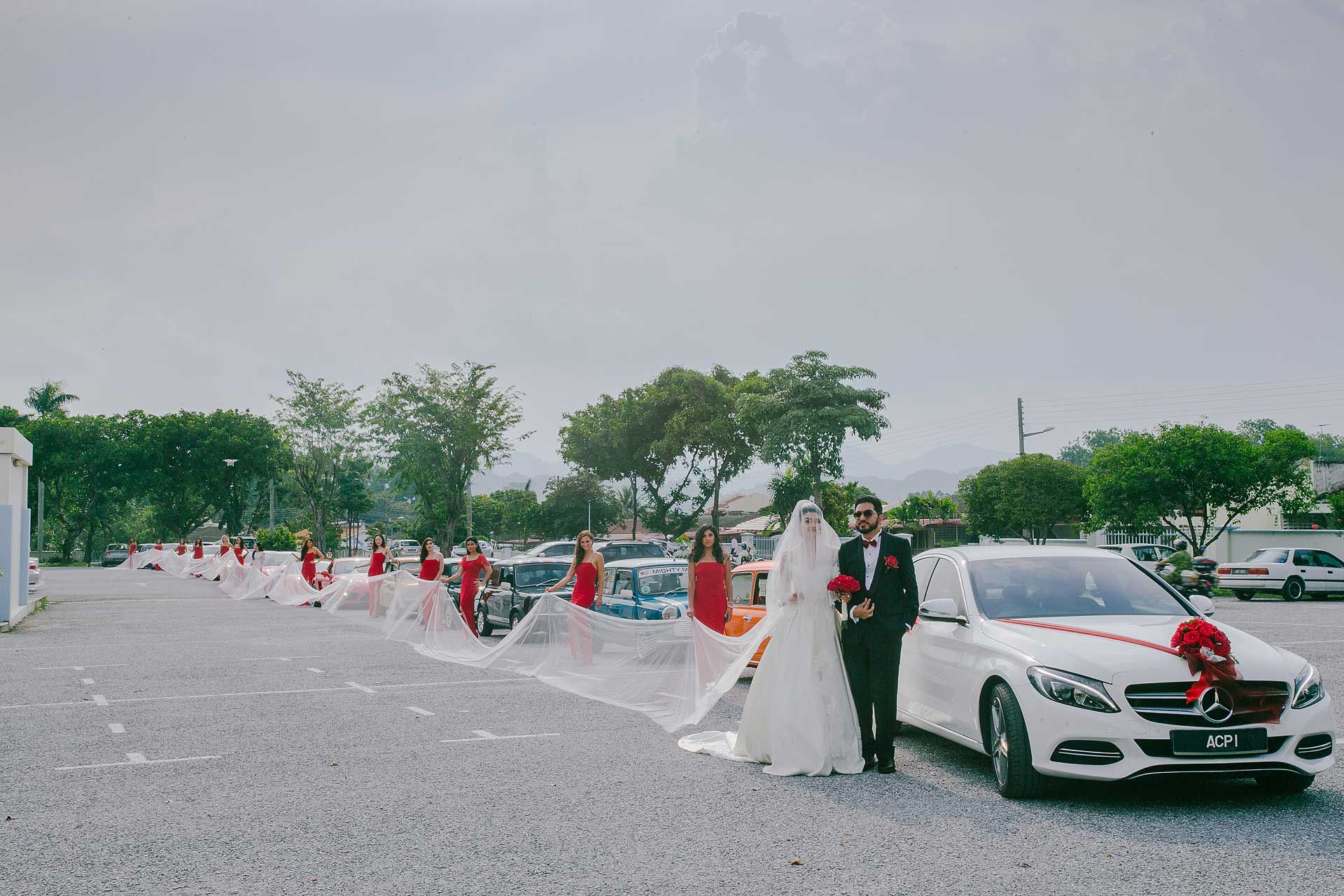 Memorialised in the Malaysian Book of Records, Olivia's wedding veil was the longest in the country at 120.56 metres. Credit goes to fashion designer Louisa Amy Michael Benzi of Pretty in White.