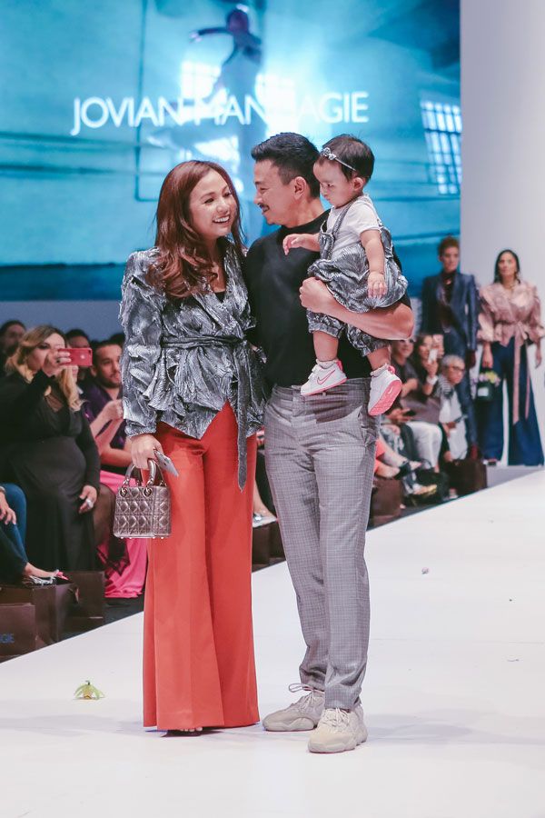 Dato' Jovian Mandagie shares a proud moment with his family on the runway. (Photo: Courtesy of Jovian Mandagie)