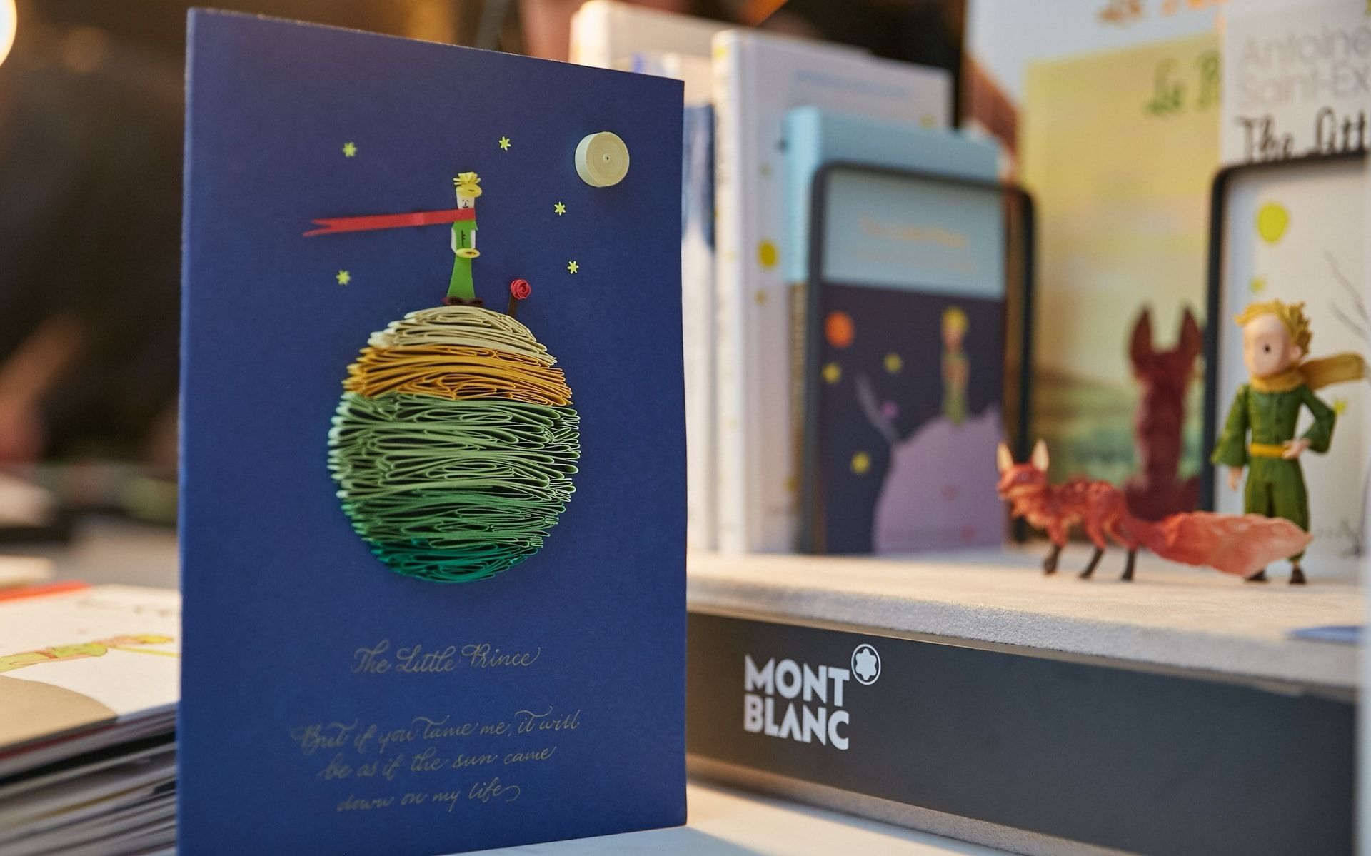 Paper quilled cards bearing characters from The Little Prince.