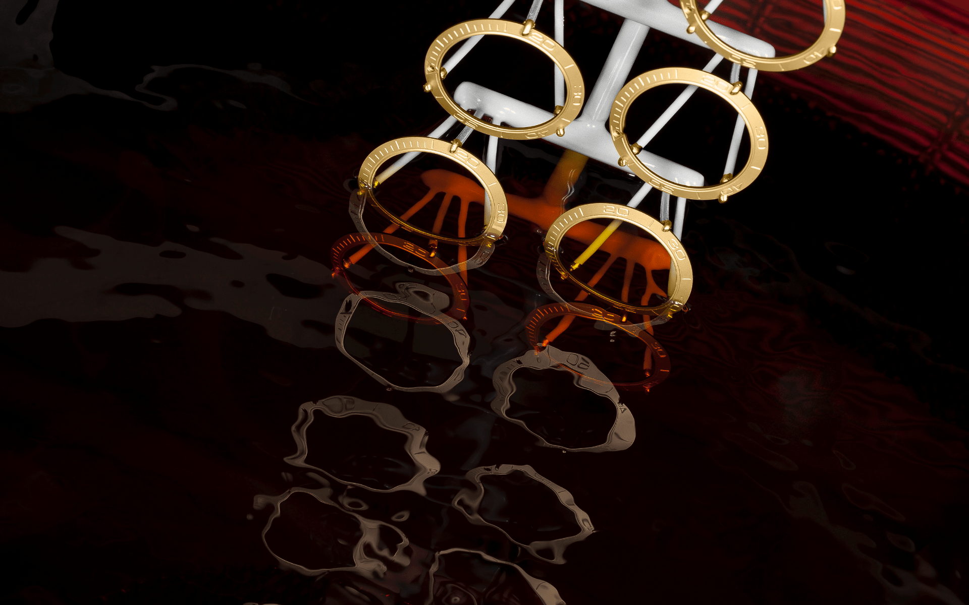 Ceramic rings dipped in gold bath (Photo: Omega)