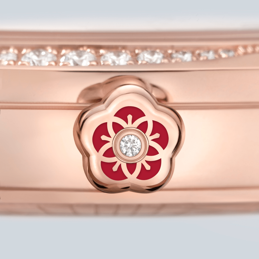 Diamond-set crown embellished with red liquid ceramic. (Photo: Omega)