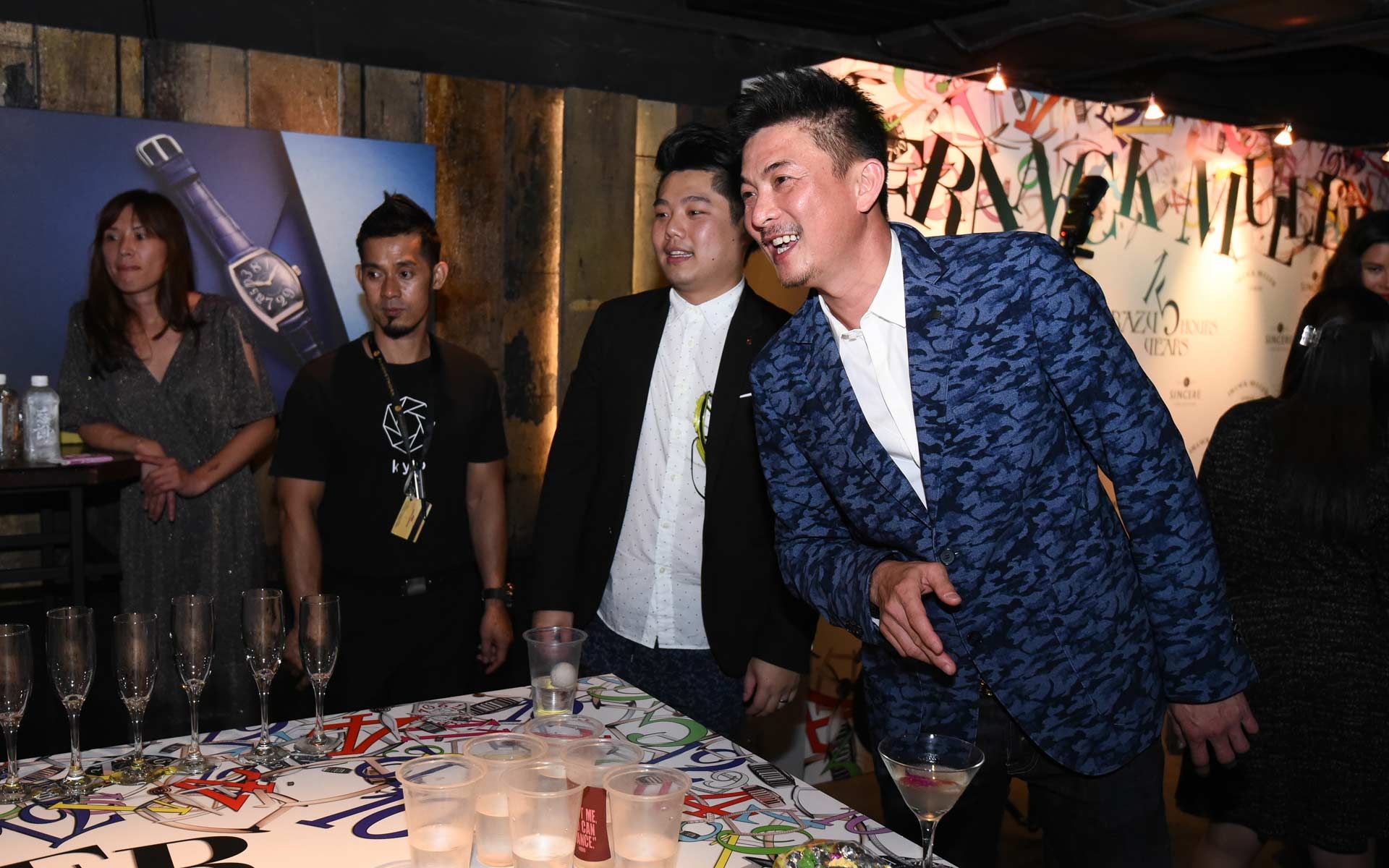 Alan Peck playing the champagne pong