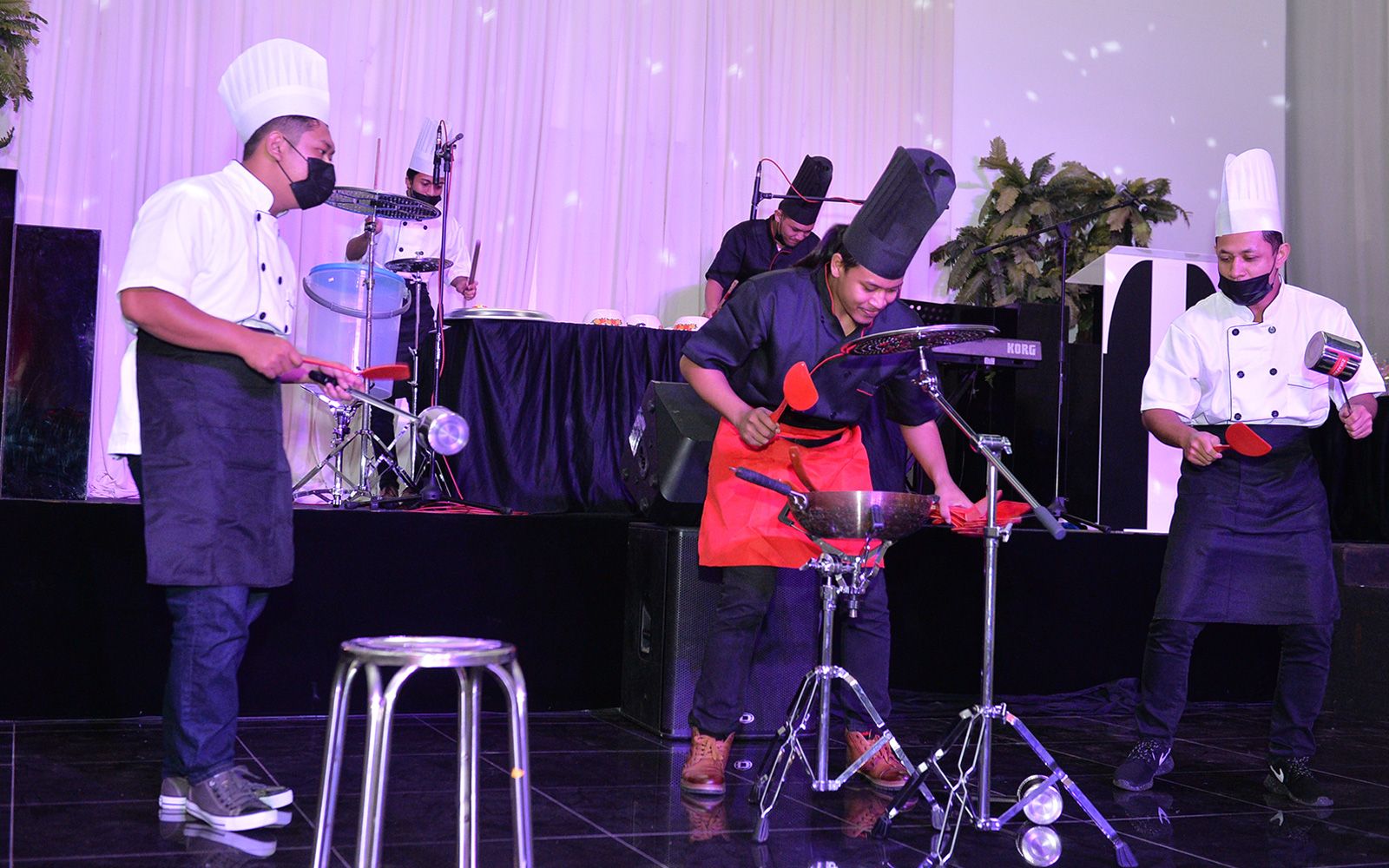 Performers for the opening gambit played a musical number using kitchen utensils