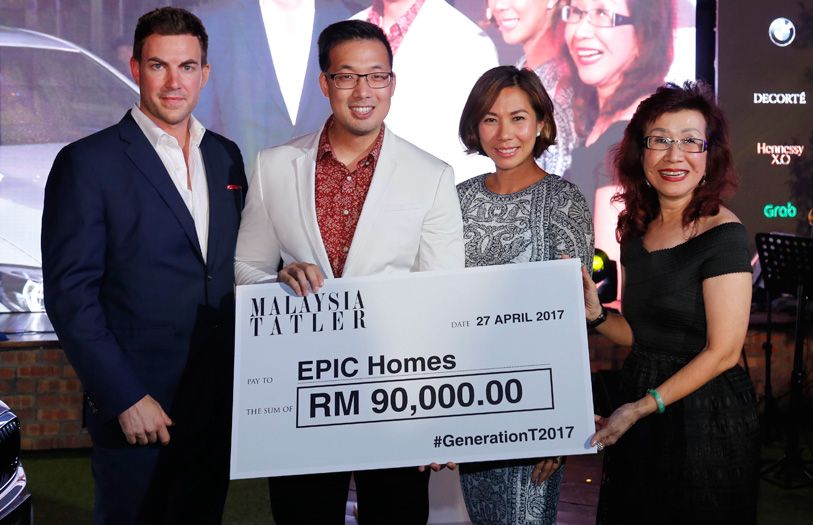 Malaysia Tatler presented John-Son Oei of Epic Homes a cheque to help build homes for the orang asli