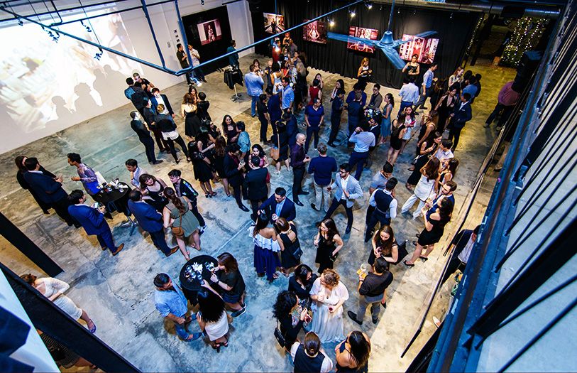 Guests mingling during the exhibition