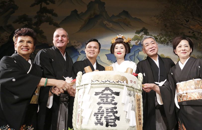 The couple and their parents during the breaking of the sake barrel before dinner.