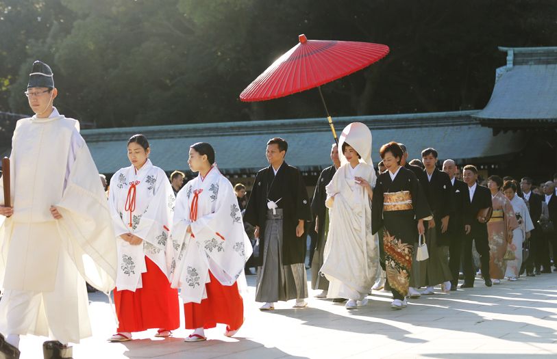 The couples closest family and friends follow in the wedding procession.