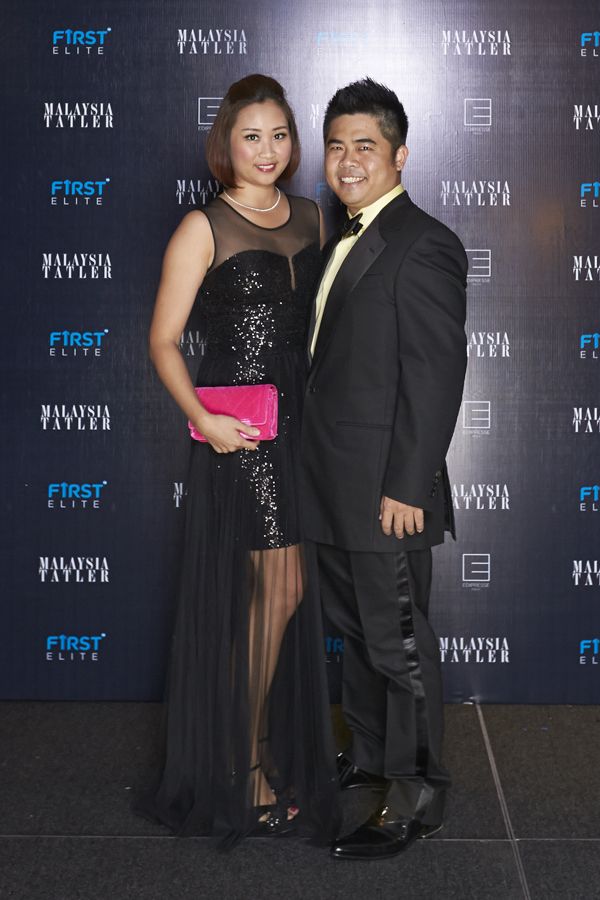 Sally Tan in BCBG and Sam Tan in Louis Vuitton