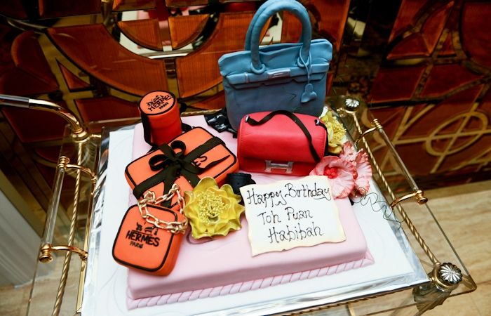 The evening was organised by one of her closest confidants, Datuk Raziah Mahmud-Geneid, who decorated the venue with beautiful floral arrrangements as well as a Hermes-themed birthday cake.