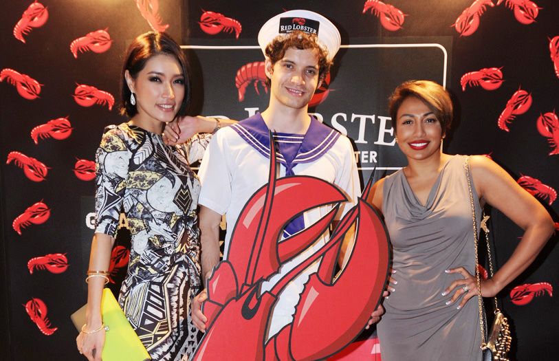 Amber Chia and Ning Baizura posing with the Red Lobster Sailorman