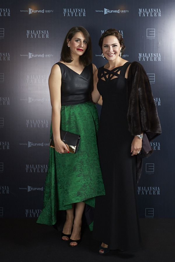 Lena Dolmatova in Alice + Olivia and Yulia Dolmatova in BCBG Maz Azria