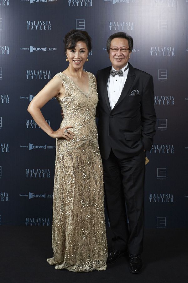 Datin Mina Cheah-Foong in Faust and Dato' Simon Foong in Versace