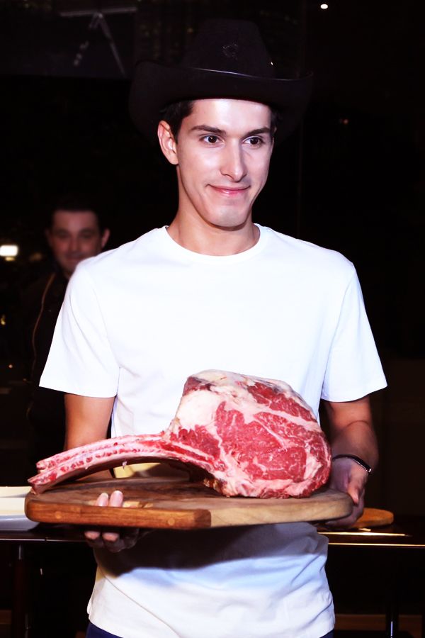 Model showcasing the steak available in Marble 8 for the food runway