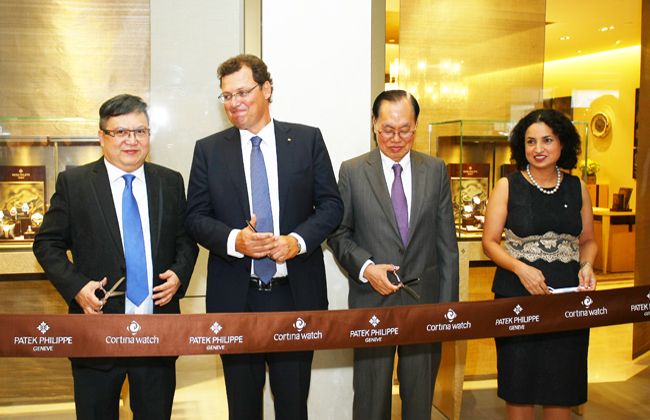 VIPs including Thierry Stern and Deepa Chatrath from Patek Philippe cutting the ribbon