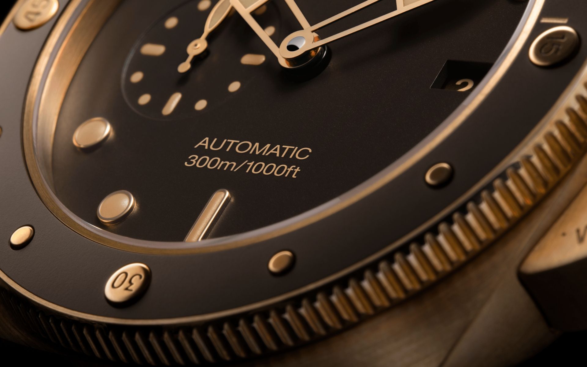 The bronze case is matched with a brown ceramic bezel and brown dial