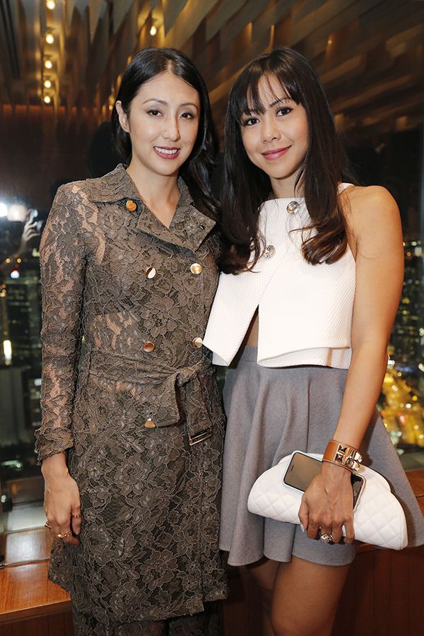 2015 May, Nobu KL launch: Datin Wira Sabrena plays on the subtle detailing like this structured crop top and quilted clutch, pictured here with Datin Shirieene Hajamaideen