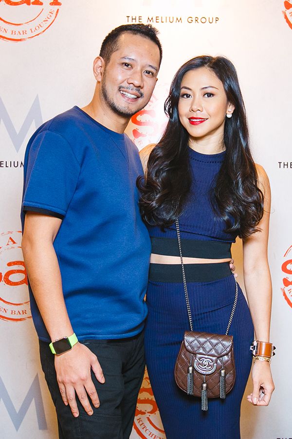 2016 March, opening on Mama San: Couple dressing is a thing for these 2—Datin Wira Sabrena opts for an all-blue, 2-piece dress and mini statement Chanel bag