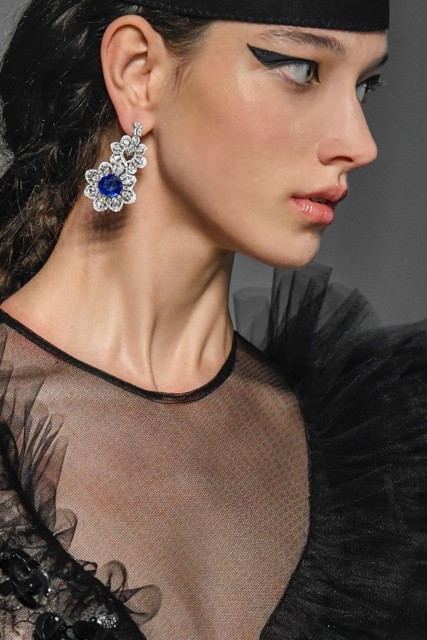 Chopard provides the haute joaillarie for the collection such as this sapphire and white diamond earring (Photo credit: Giambattista Valli)