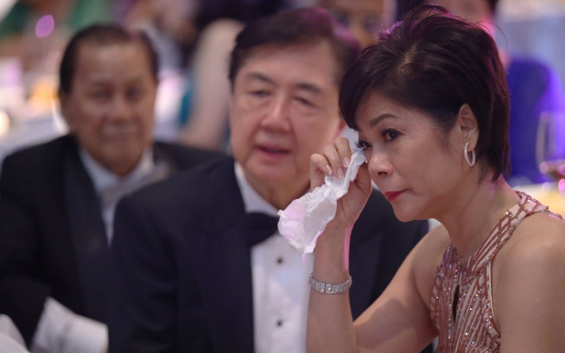 The groom's parents, Dato' Jaya Tan and Datin Regina Tan, overcome with emotion during the speeches