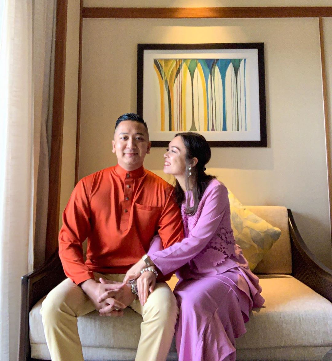 2 things on Siti Saleha's mind in this photo: How good her husband Ahmad Lutfi looks, and the curry that awaits at her Mak Tok's house. (Photo credit: @sallywho / Instagram)