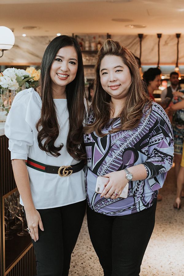 2018, May: Although it's just a birthday party, Datin Yvette keeps her casual look put together with a statement Gucci belt, with Yap Ai Leen at Chad & Casper Teh's 1st birthday