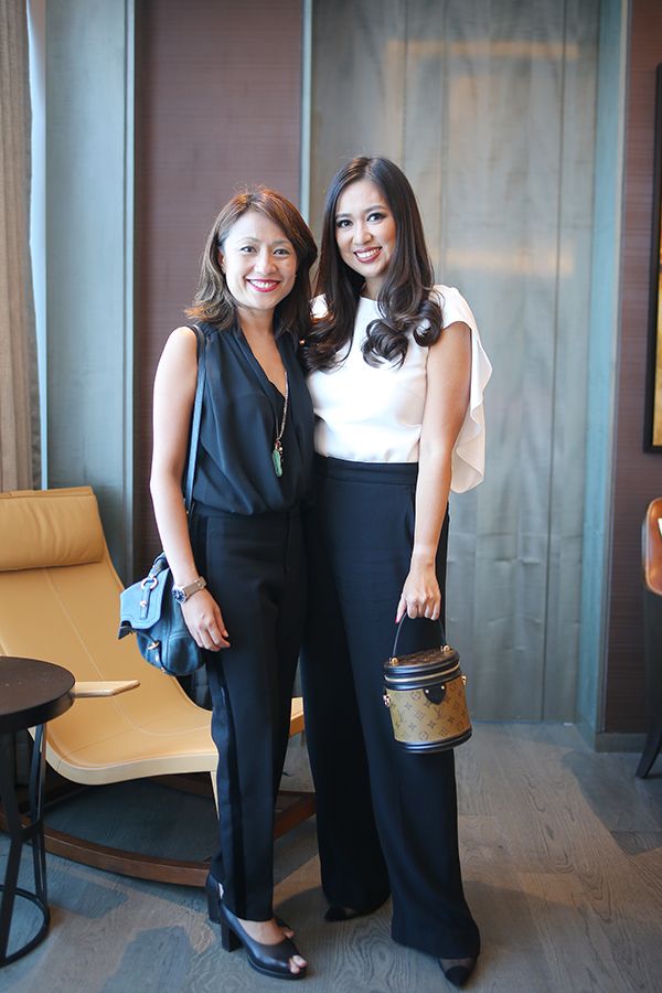 2019, April: Datin Yvette can't deny the elegance of a monochrome getup like this minimalist one, completed with a Louis Vuitton bucket box monogram bag, at a Malaysia Tatler afternoon tea with Lancôme